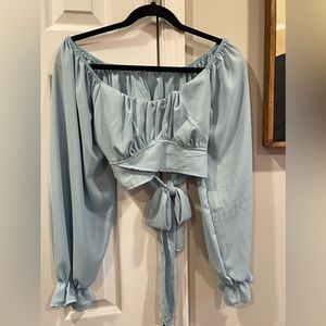 Off the shoulder light blue long sleeve wrap shirt
